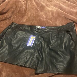 Future collective fake leather skirt . Never worn Is like an asymmetrical cut.